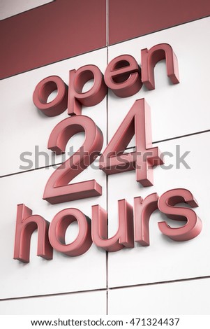 Generic red 3D 'Open 24 Hours' wall sign.