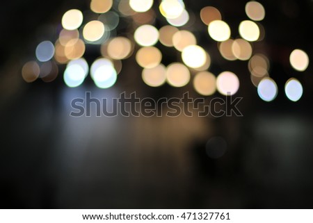 blurred backgrounds of bokeh from car light on the traffic road