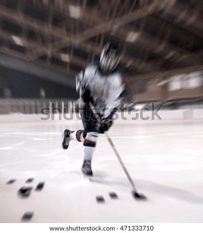Ice hockey player on the ice-blurred