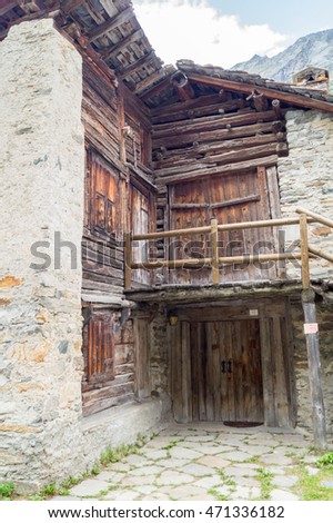 House, wooden chalets in the mountains, chalets old house in the Alps