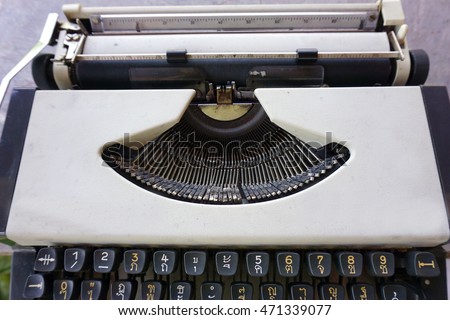 Close up of old style and technology typewriter