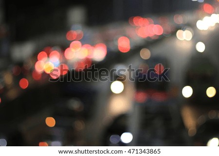 blurred backgrounds of bokeh from car light on the traffic road