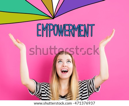 Empowerment concept with young woman reaching and looking upwards