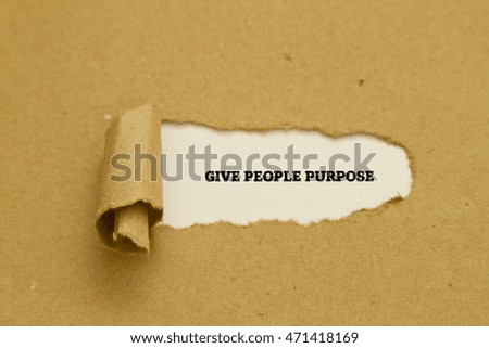 GIVE PEOPLE PURPOSE message written under torn paper.
