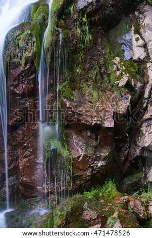 Pisoaia waterfall in romania. vertical format