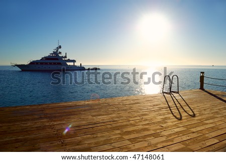 tropical sunrise pier Royalty-Free Stock Photo #47148061