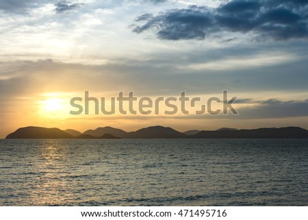 Sunset over the mountains and the sea,Sattahip Thailand
