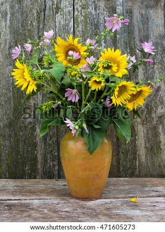 Summer bouquet of Hollyhock Mallow and Sunflowers