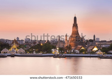 Arun temple river front with sunset sky background, Bangkok Thailand Landmark