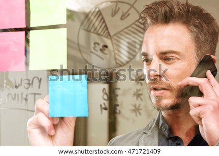 Portrait of serious man on business call with transparent idea board
