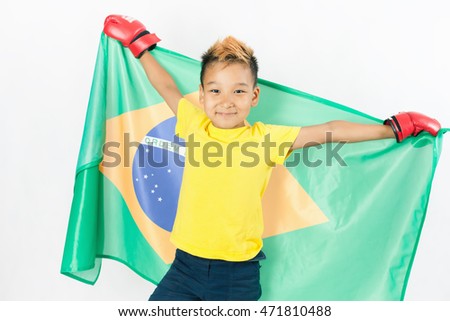 Brazilian patriot and fan boy holding Brazil flag. Box, boxing championship. Support. White background