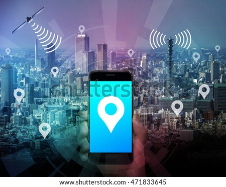 smart city and smart phone application using location information, hand hold smart phone communicating with satellite and wireless communication antenna, abstract image visual