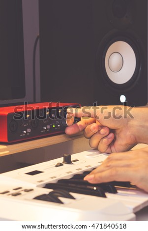 right hand tuning knobs of studio gears, pre-amp, audio interface, effect signal processor for TV radio broadcasting, post production or music concept. art filter