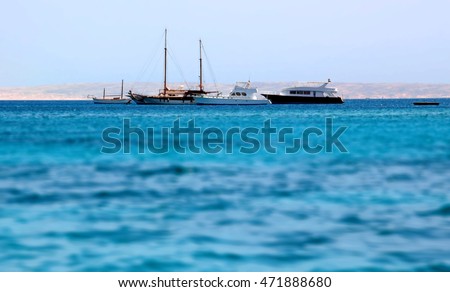 yachts and ships distant in the Red Sea. tilt shift blur effect Royalty-Free Stock Photo #471888680