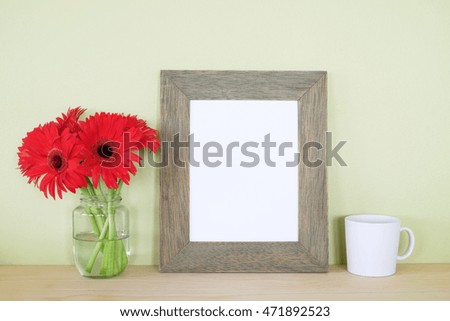 frame with flower and coffee cup.sunday morning