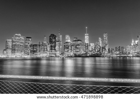 Downtown Manhattan and water reflections at sunset, new York City.