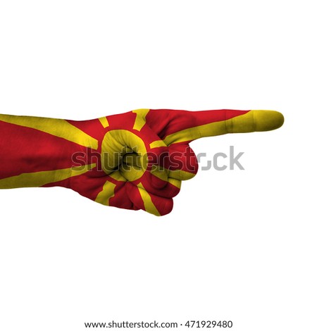 Hand pointing right side, macedonia painted with flag as symbol of right direction, forward - isolated on white background