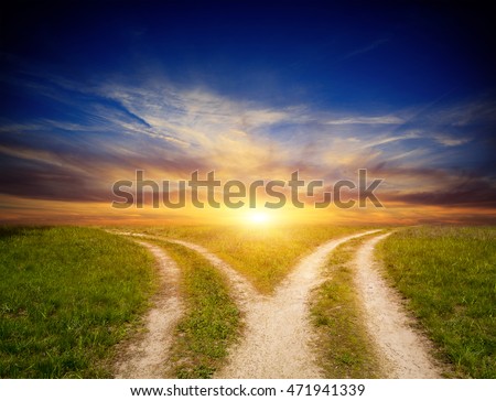 scene with fork roads in steppe on sunset sky background Royalty-Free Stock Photo #471941339