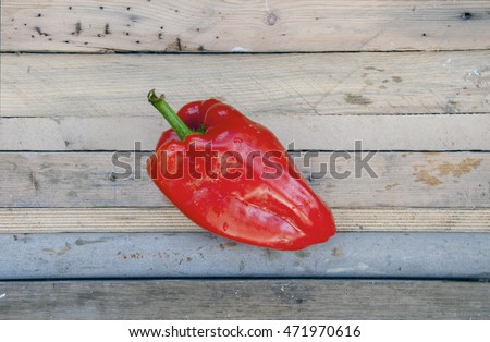 red pepper on the wooden table
