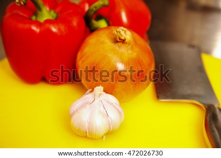 Picture of different vegetables represented on table: onion, garlic, pepper, etc. Vegetables concept.
