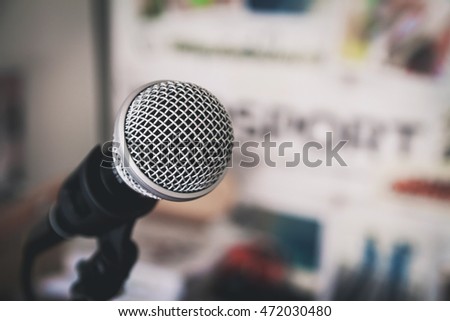 Close up of microphone in car show room