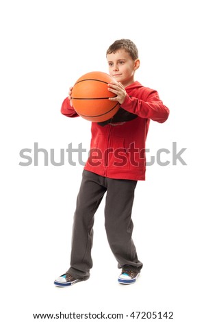 Portrait of a schoolboy with a basketball isolated on white