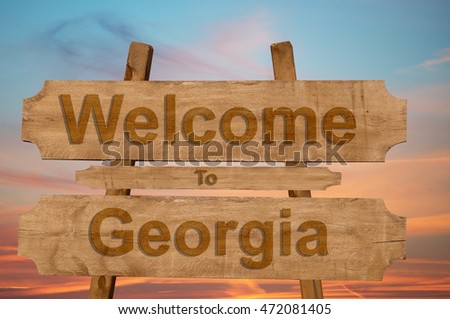 Welcome to Georgia sing on wood background 
