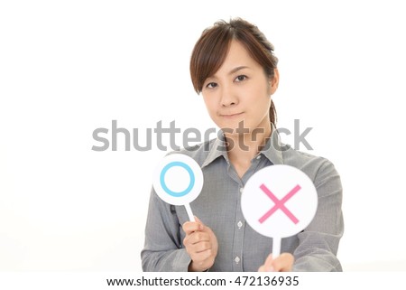 Woman trying to make a decision between Yes or No choice