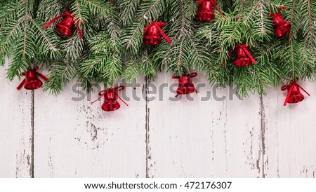 Old wood texture with snow and firtree christmas background