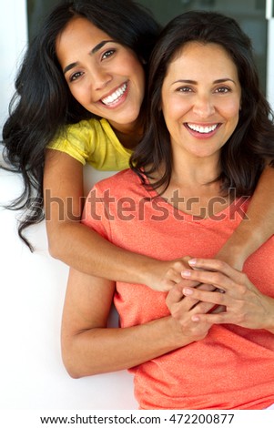 Hispanic Mother and daughter.
