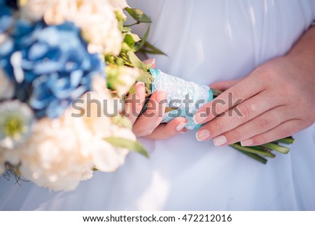 Wedding bridal bouquet in the hand of bride