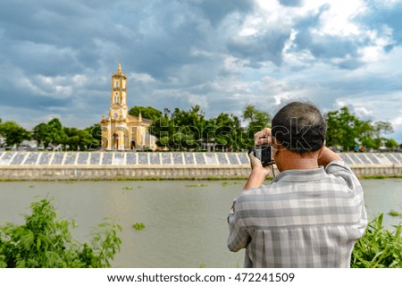 man tourist Taking photo Wat in Ayutthaya