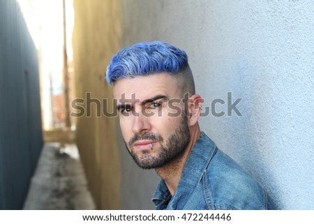 Blue haired guy walk on old rusty creepy tunnel