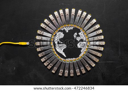 Internet SFP network modules  as the shape of Earth and RJ45 ethernet cable for communication. Concept of internet security/computer data encryption / data protection / security enhancement