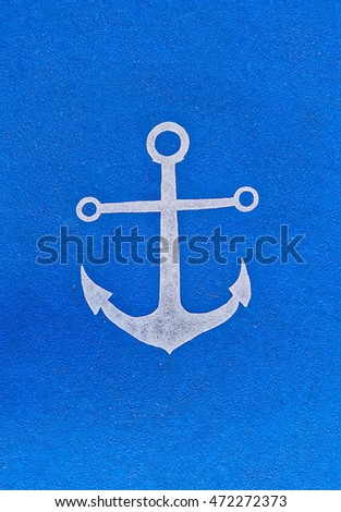 Hand painted white flat marine anchor icon on a blue road surface. Blue background. Sea nautical logo, badge, design, style, icon and element.