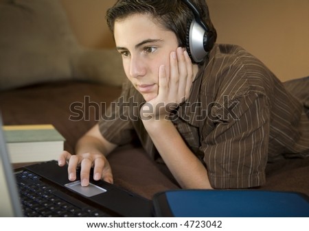 High school student studying while listening to music