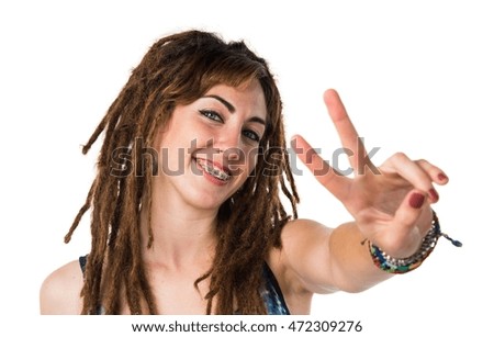 Girl with dreadlocks counting two
