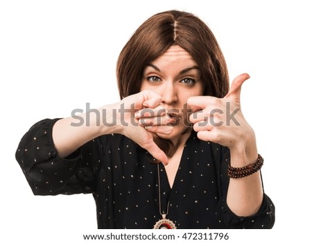 Woman making good-bad sign