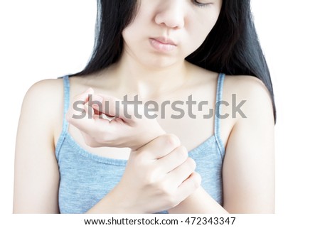 Acute pain in a woman wrist isolated on white background. Clipping path on white background