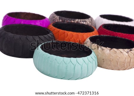 Fashion snakeskin (python) bracelets isolated on a white background