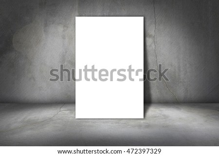 white frame on a concrete wall and floor