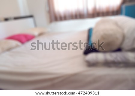 Blur of dirty bed and pillow from saliva stain