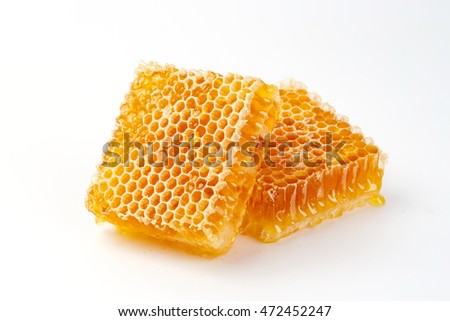 Honeycomb isolated on white background Royalty-Free Stock Photo #472452247