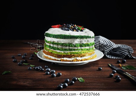 Delicious cake on dark background