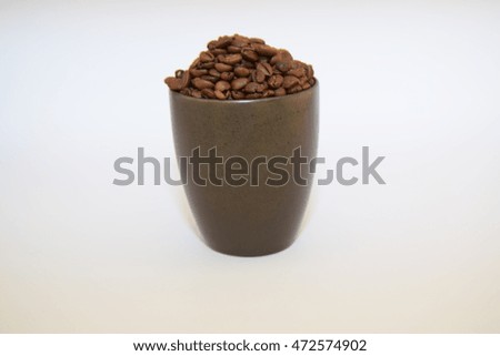 Coffee beans in a cup
