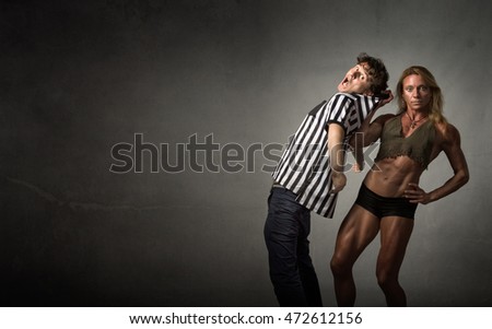 wrestling problem with referee, dark background
