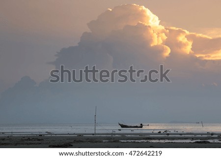 fisherman boat at sunset 