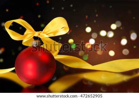 Christmas balls and light on a dark background
