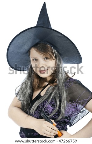 The girl in a suit of a witch with a mop in hands