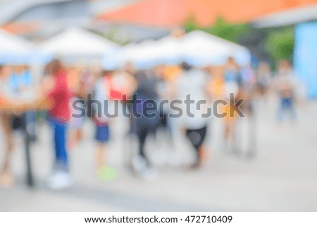 Abstract blurred image of shopping mall and people

